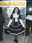 Cosplayfoto vor unserer Fotocollage auf der FBM 2009 